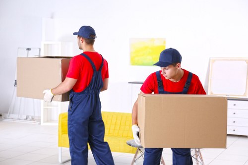 Van moving team preparing safely before a removal job