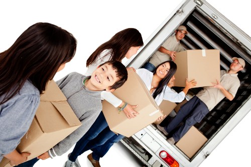 Professional house removalists loading boxes in Westminster