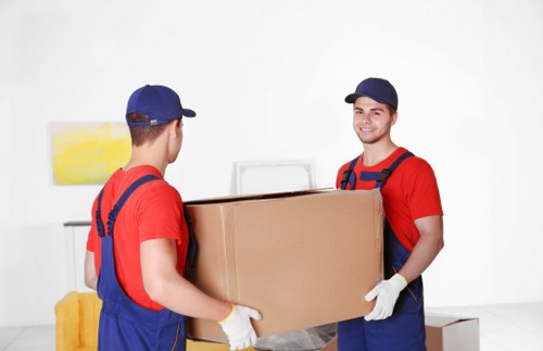 Professional man and van helping with residential relocation in Westminster