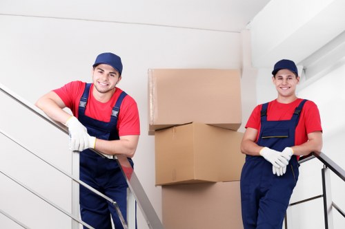 Moving team in Westminster preparing items safely with protective equipment