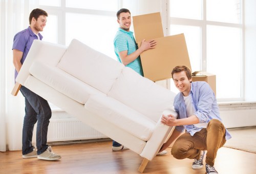 Careful furniture handling during a flat move in Westminster