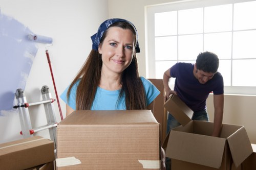 Stacked storage-ready packing boxes used for Westminster moves