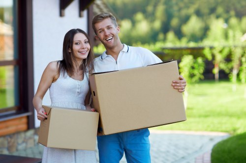 Loading furniture into a moving truck in Westminster