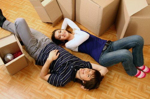 Professional movers handling furniture in central London